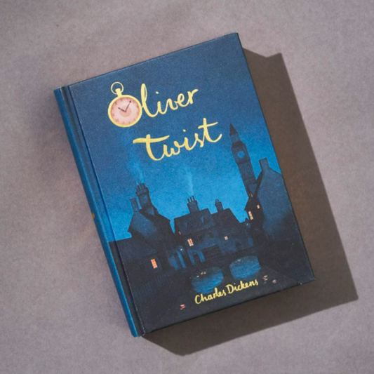 Book titled 'Oliver Twist' by Charles Dickens on a blue background