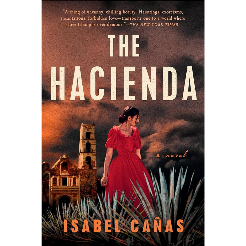 Book cover for 'The Hacienda' by Isabel Cañas, featuring a woman in a red dress standing in front of a large stone hacienda under a dramatic orange sky, with agave leaves in the foreground.
