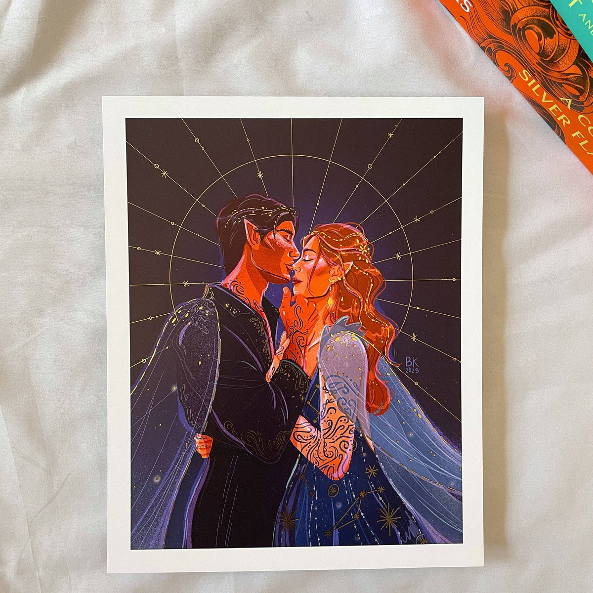 Illustration of a couple embracing with starry background on a white surface