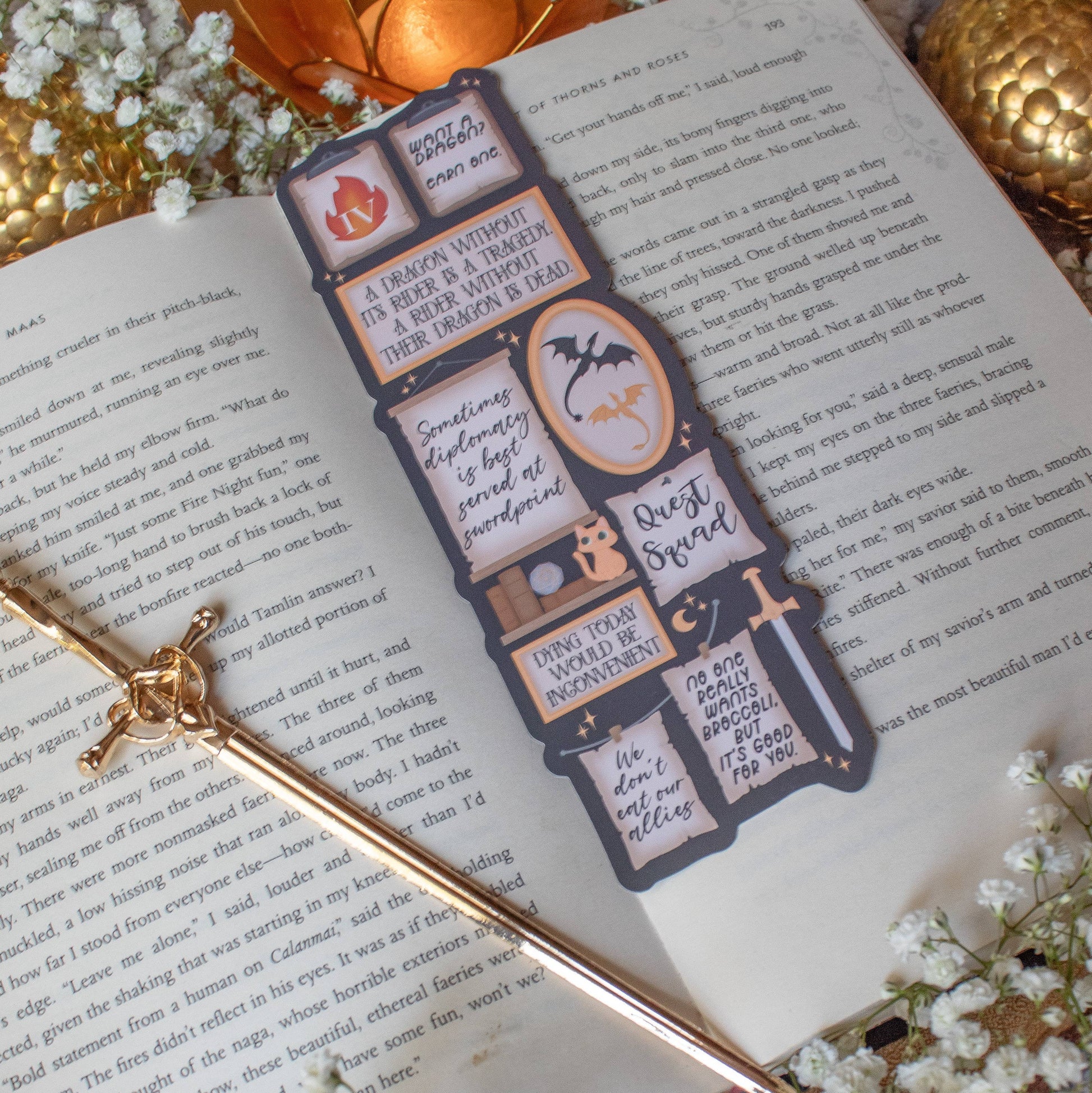 Decorative bookmark on an open book with decorative elements around