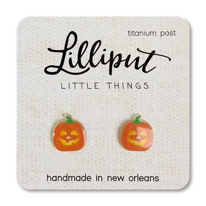 Lilliput Little Things pumpkin earrings on a branded card.