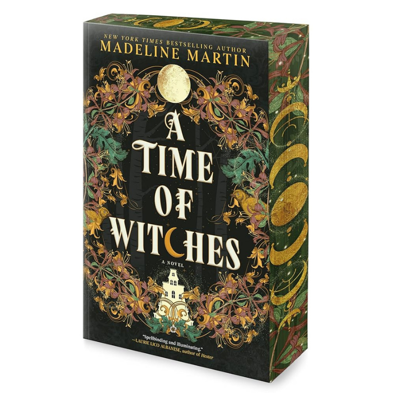 Book cover of 'A Time of Witches' by Madeline Martin with decorative elements on a white background